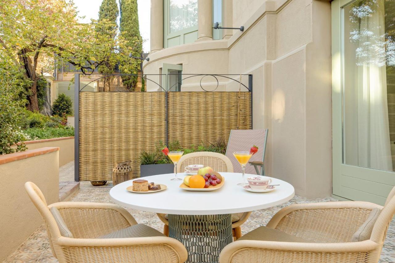 Hotel Boutique Mirlo 바르셀로나 외부 사진 A typical patio
